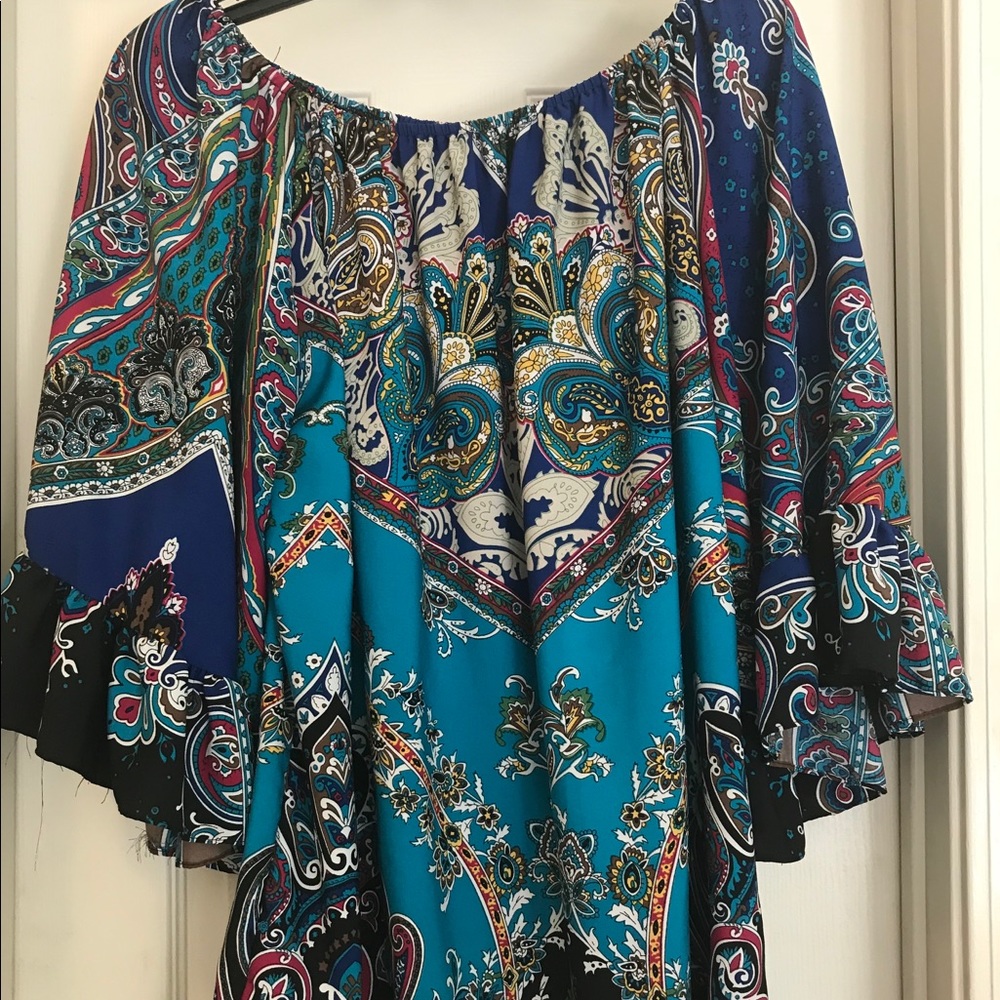 Multicolored tunic great for summer or fall.